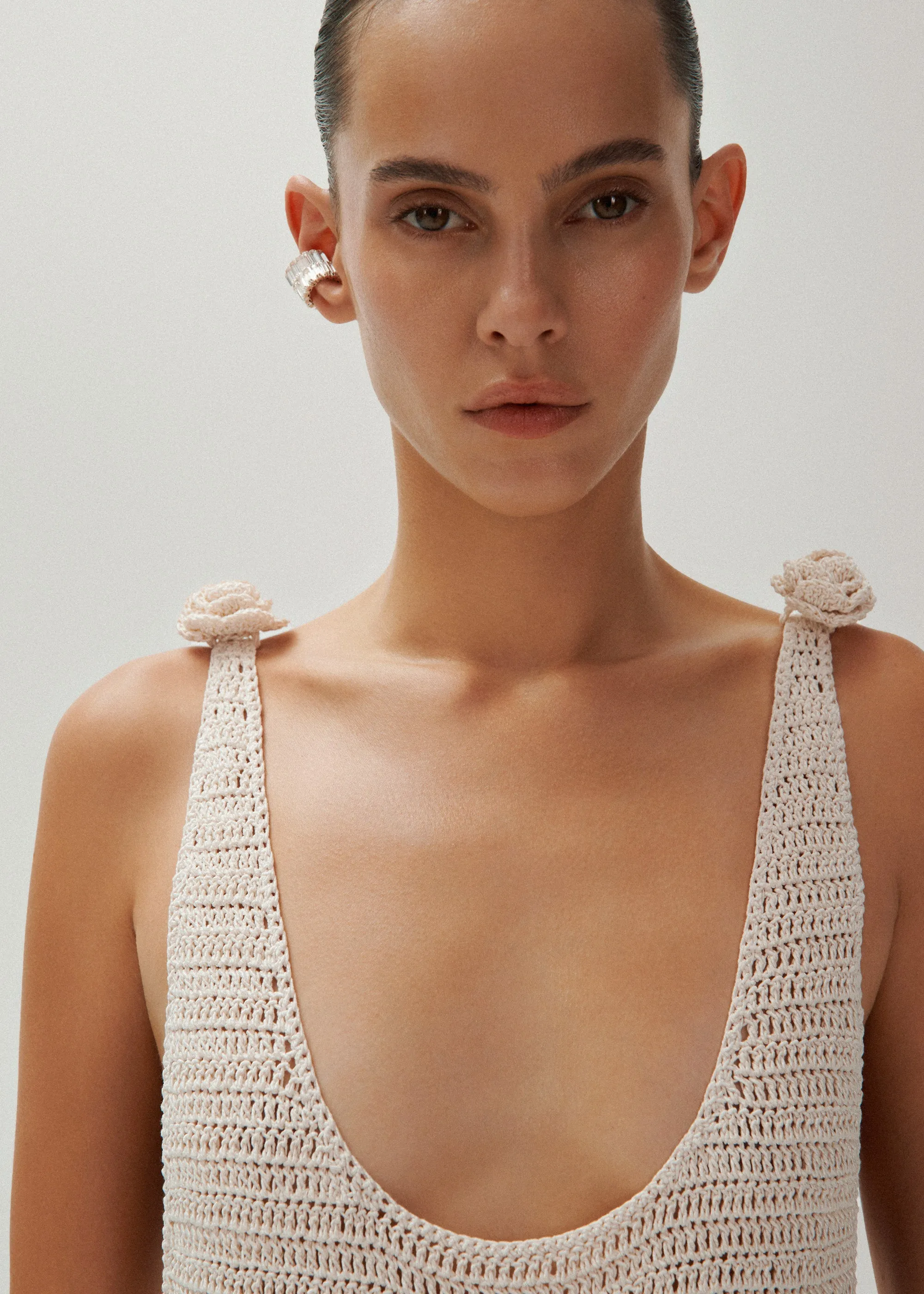 Crochet rosette bodysuit in beige