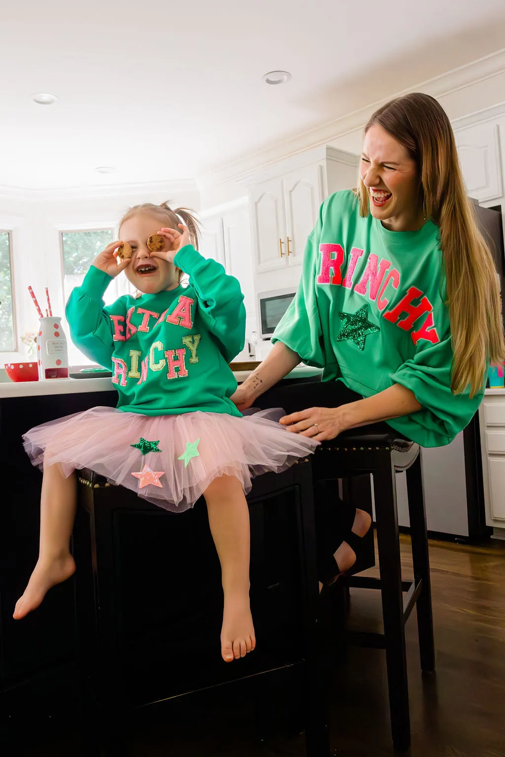 GRINCHY PINK VARSITY PULLOVER